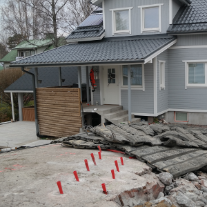 rakennusten perustuksen louhintaa