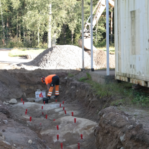 rakennusten perustuksen louhintaa